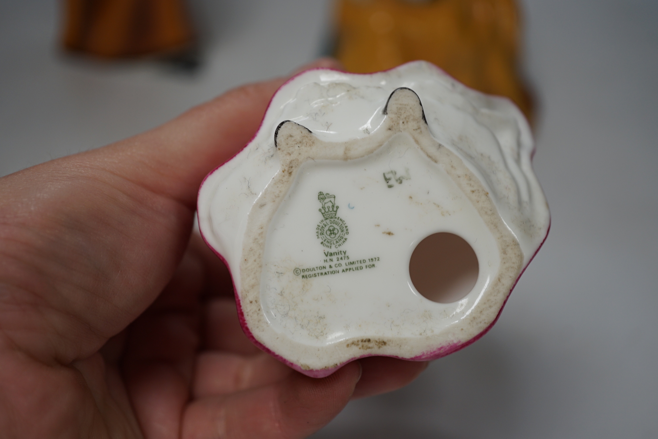 Ten Doulton porcelain figurines